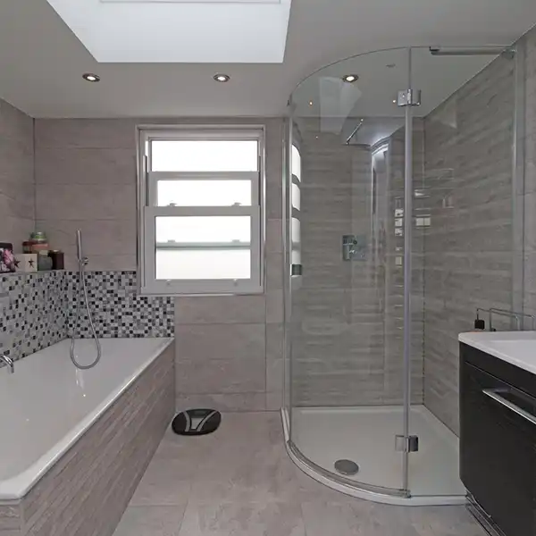 New upstairs bedroom created by Weybridge KT13 double-storey extension